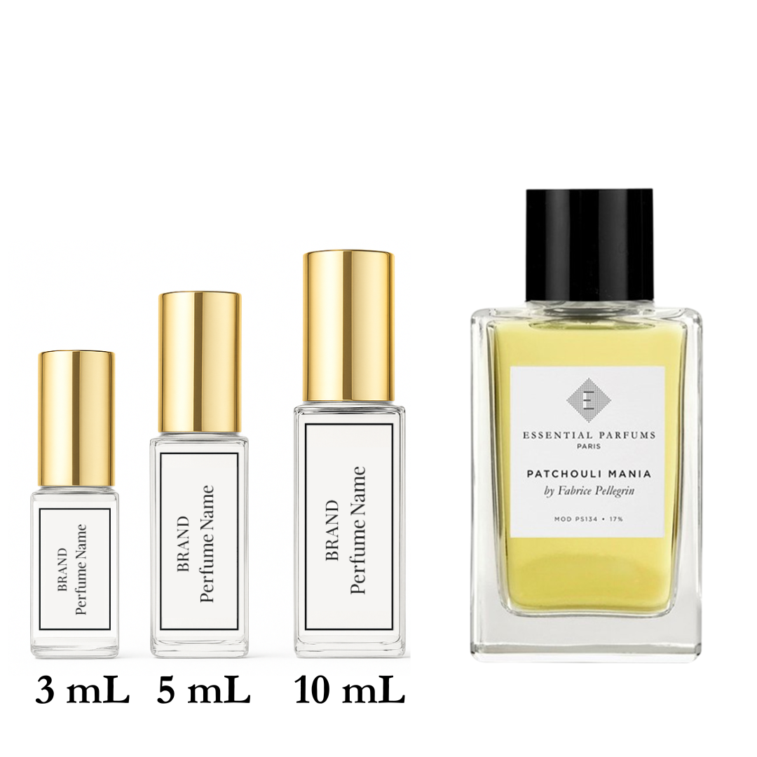 Set of four perfume bottles with different sizes on a white background