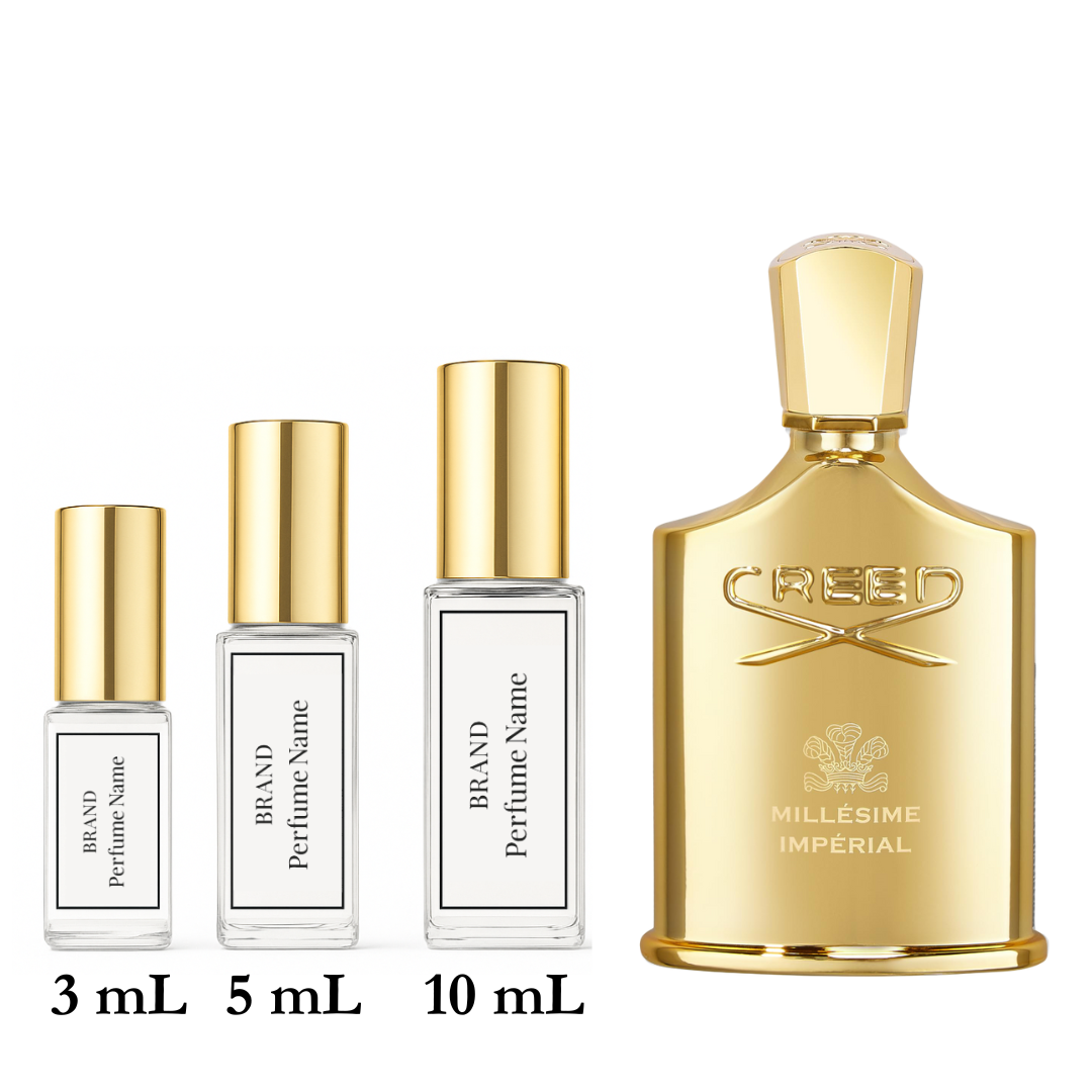 Set of Creed perfume bottles in various sizes on a white background