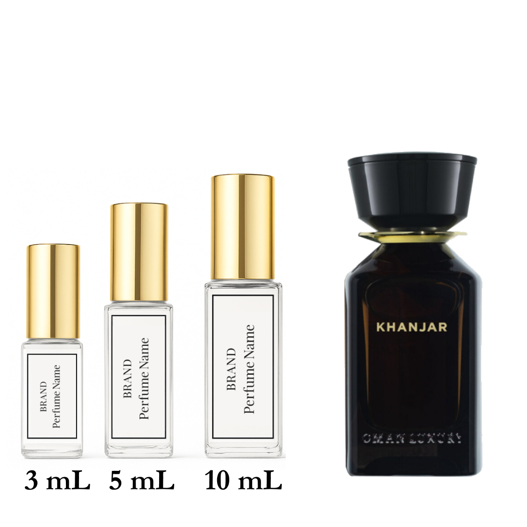 Set of perfume bottles with different sizes on a white background