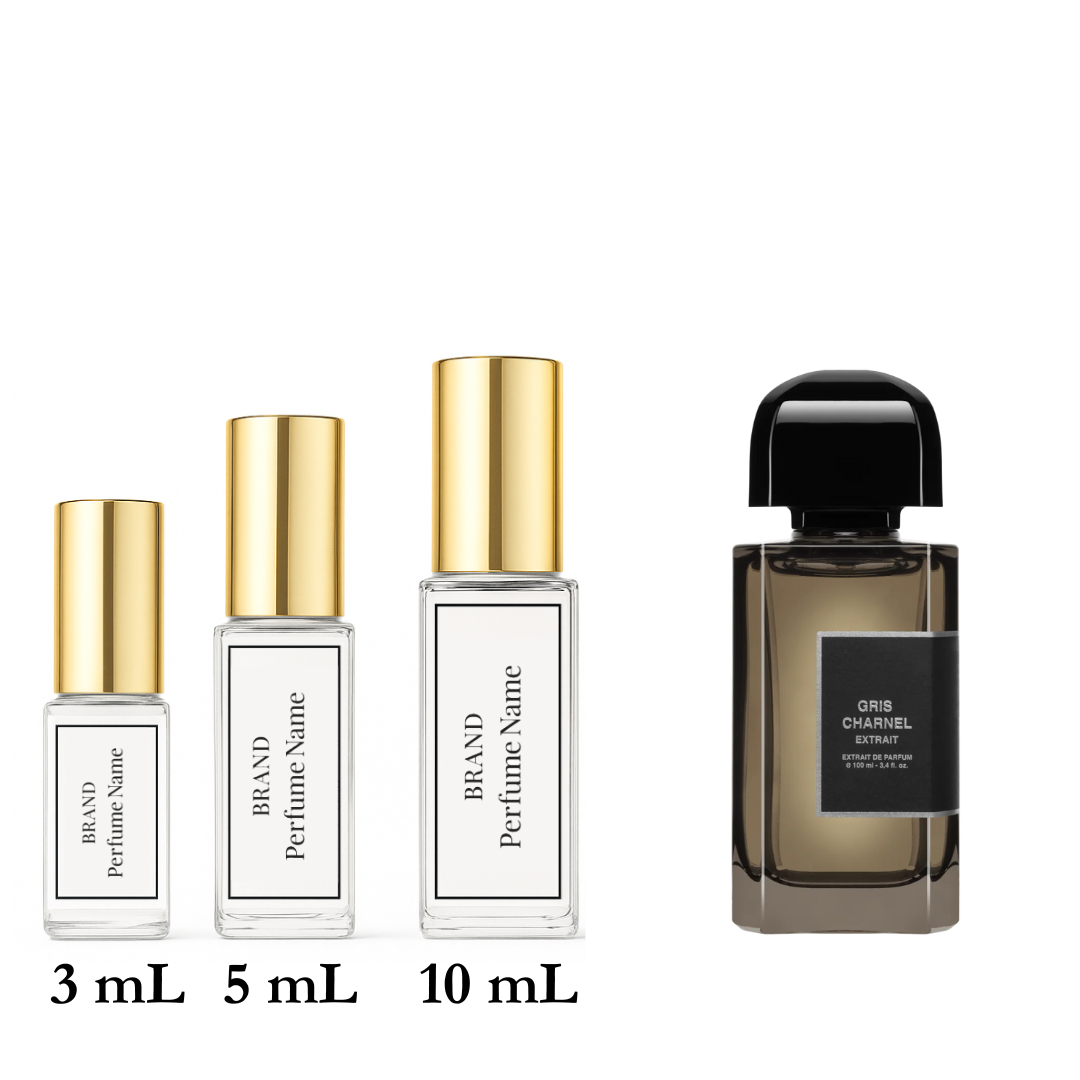Set of four perfume bottles with varying sizes on a white background