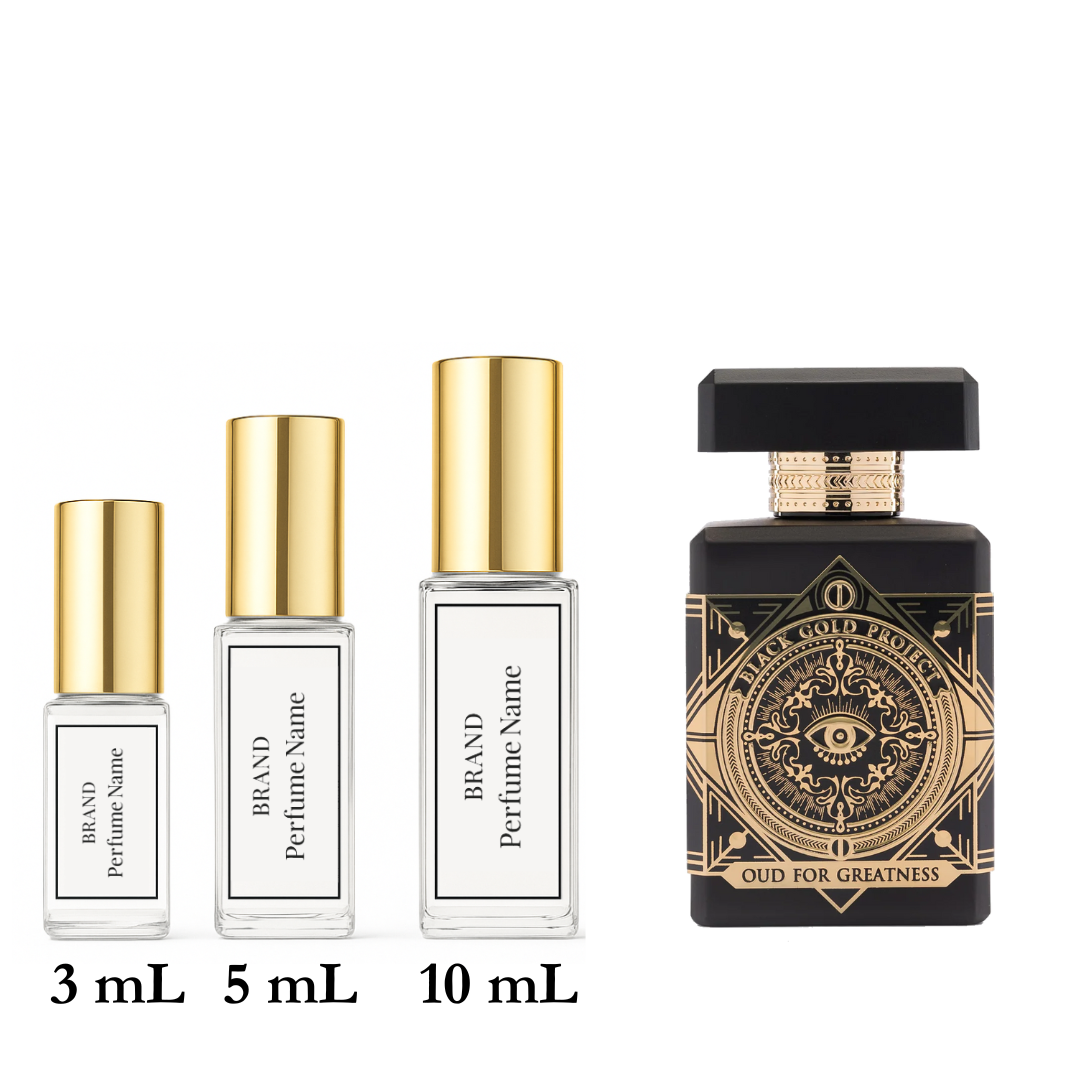 Set of perfume bottles with different sizes on a white background