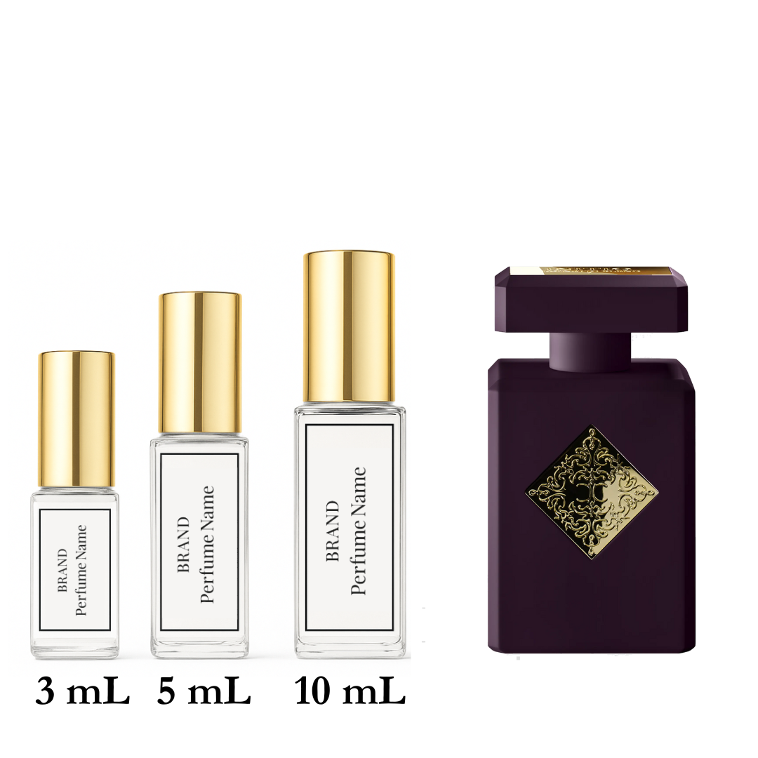 Set of perfume bottles with different sizes on a white background