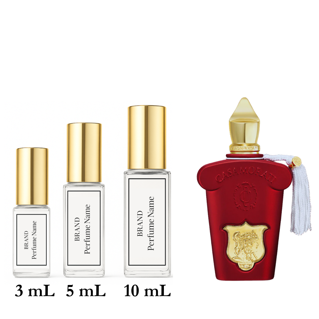 Set of perfume bottles with different sizes on a white background