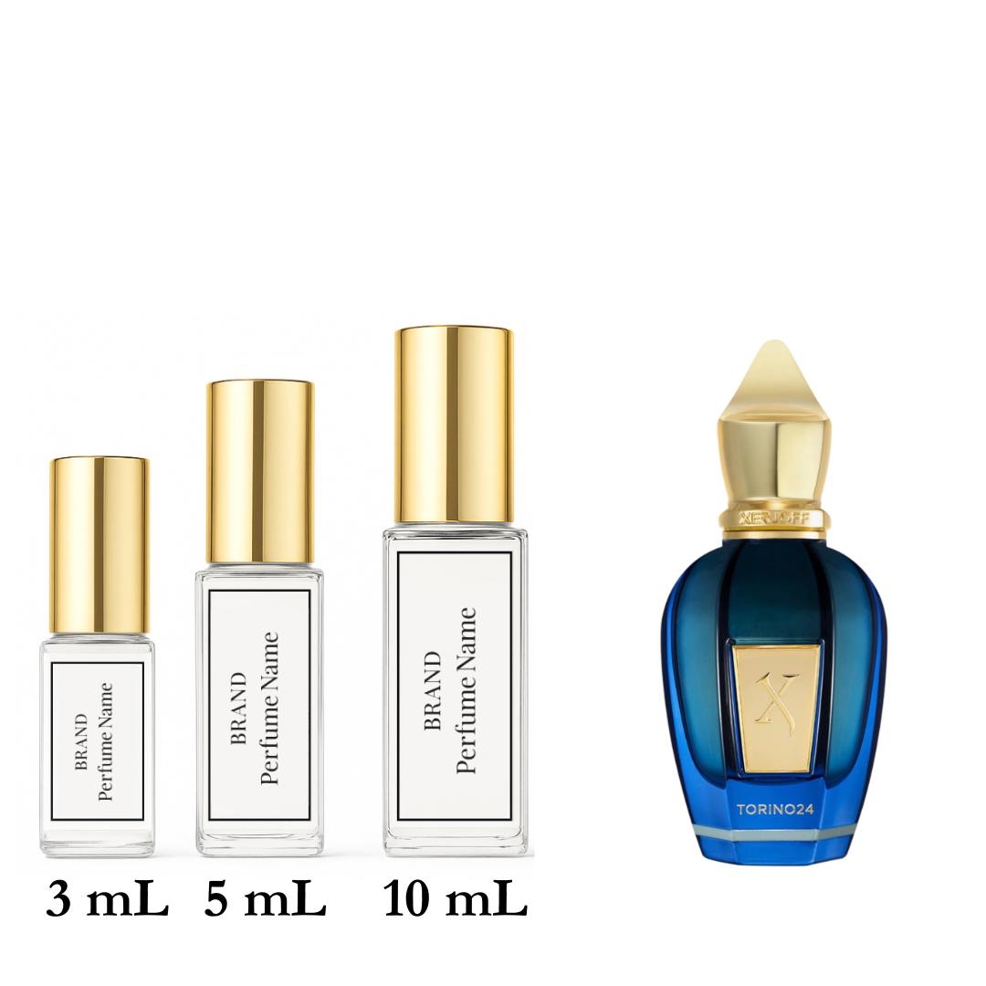 Set of four perfume bottles with varying sizes on a white background