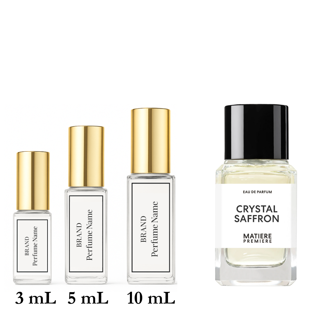 Set of four perfume bottles with different capacities on a white background