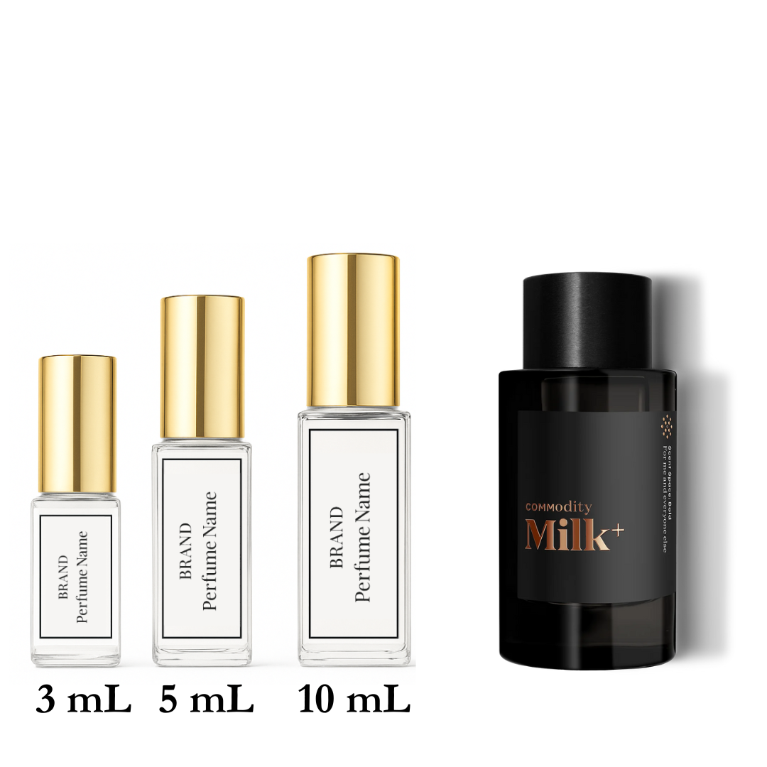 Collection of perfume bottles with different sizes on a white background