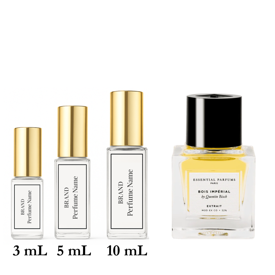 Set of four perfume bottles with different sizes on a white background