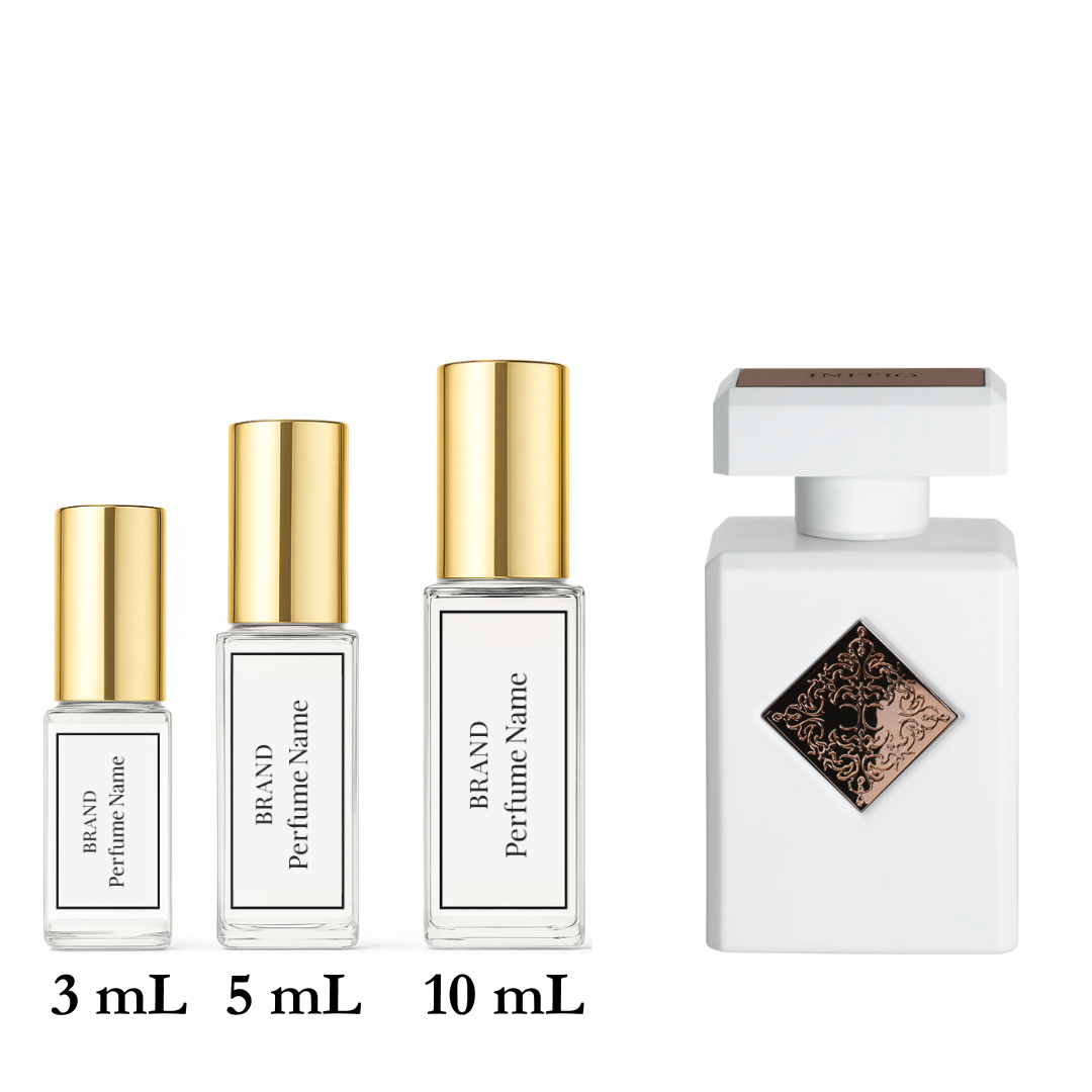 Set of perfume bottles with different sizes on a white background
