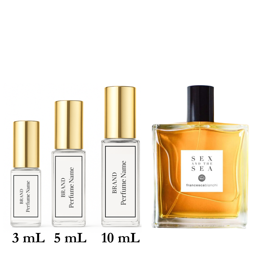 Set of perfume bottles with different sizes on a white background