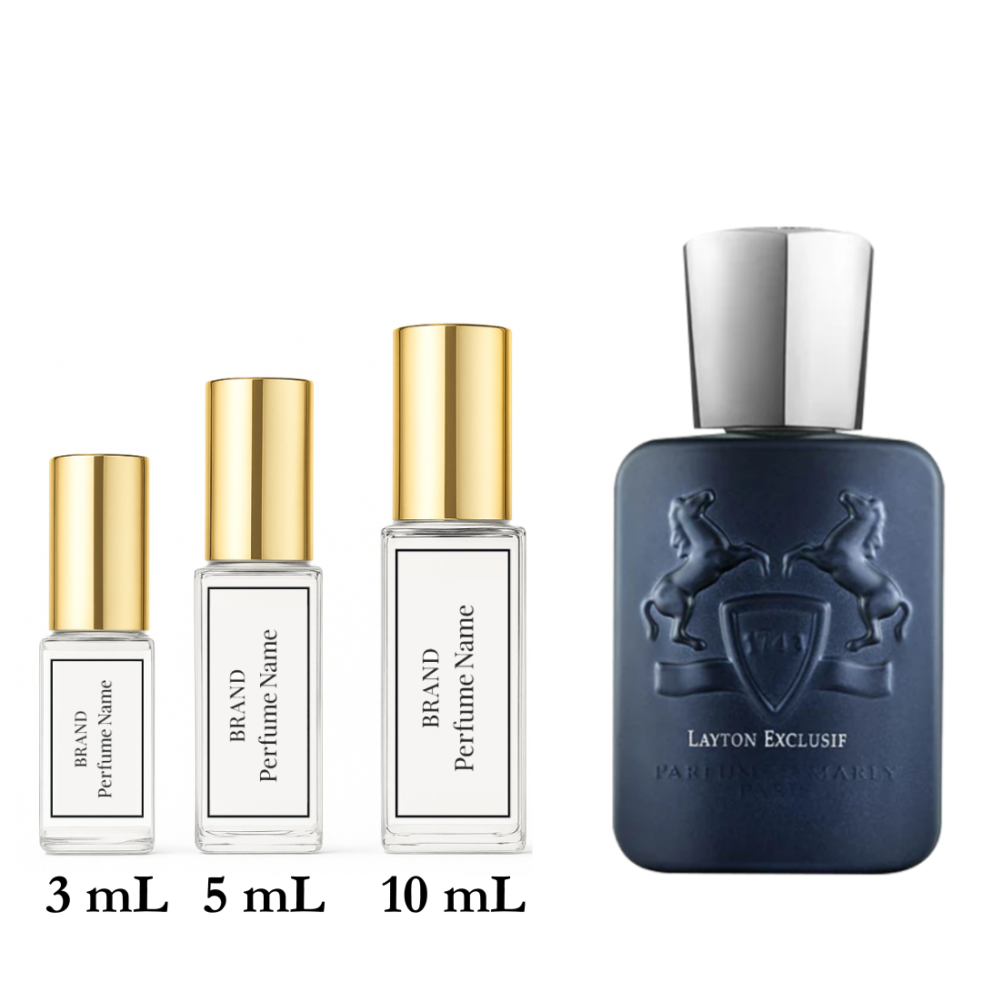 Set of perfume bottles with different sizes on a white background