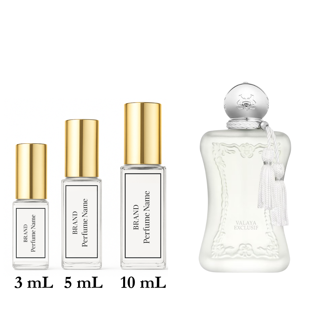 Set of perfume bottles with different sizes on a white background