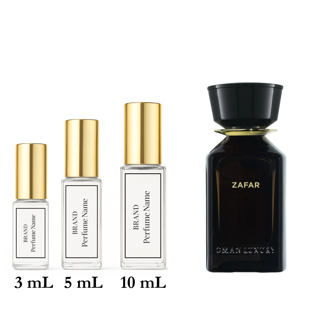 Set of perfume bottles with different sizes on a white background