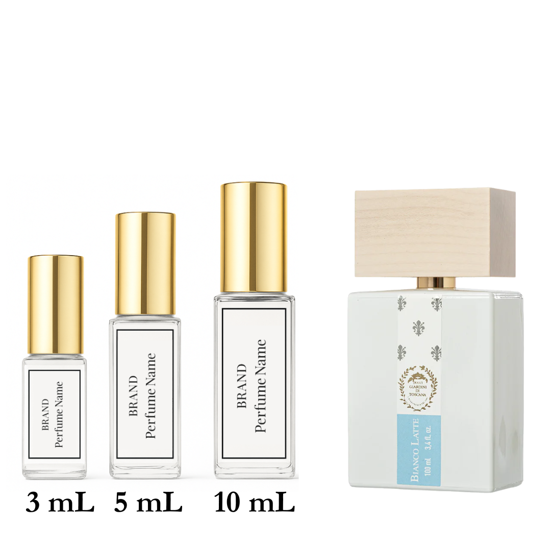 Set of four perfume bottles with different sizes on a white background