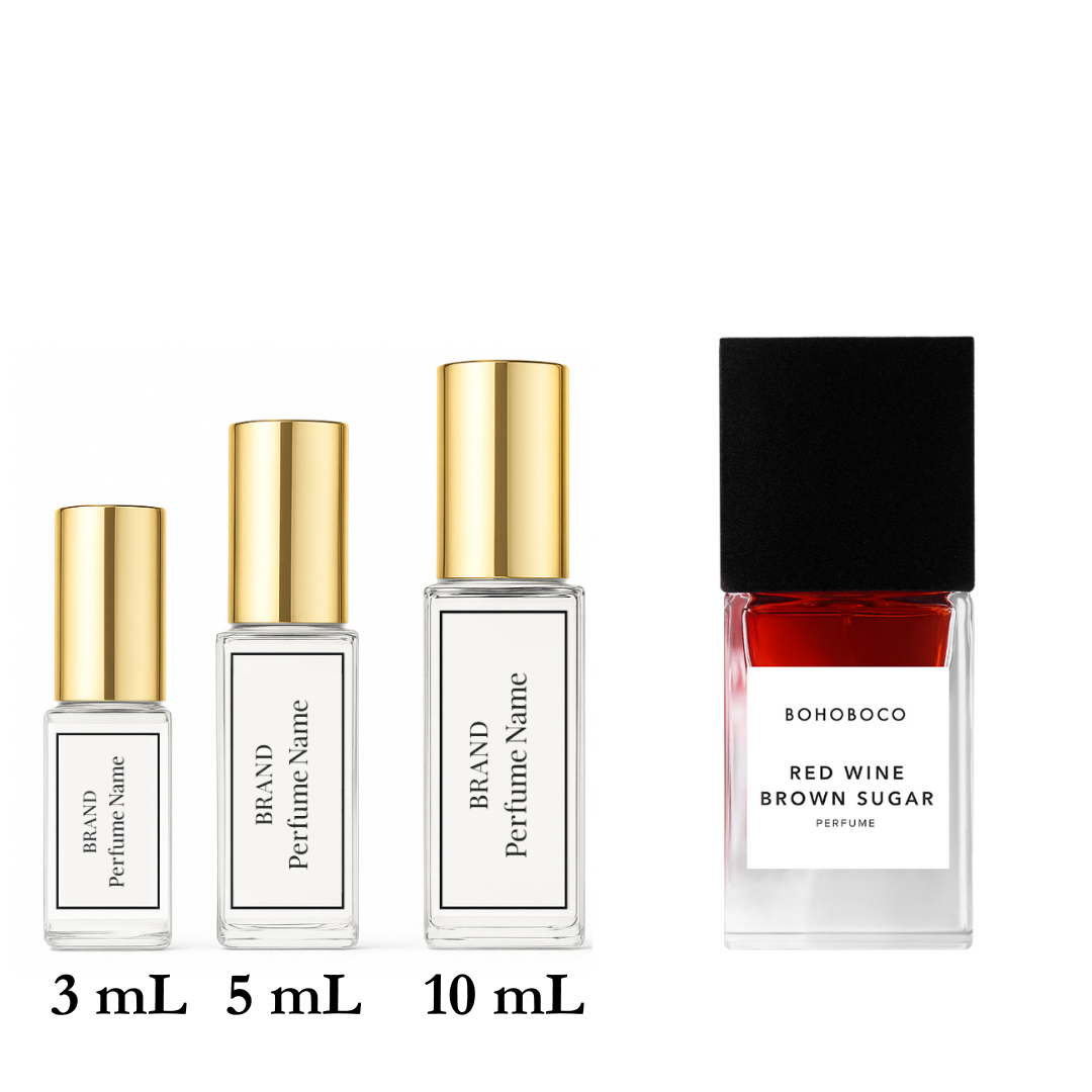 Set of perfume bottles with different sizes on a white background
