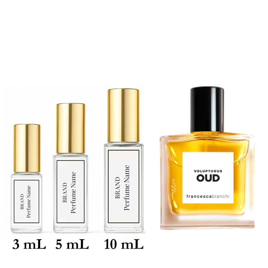 Set of perfume bottles with different sizes on a white background