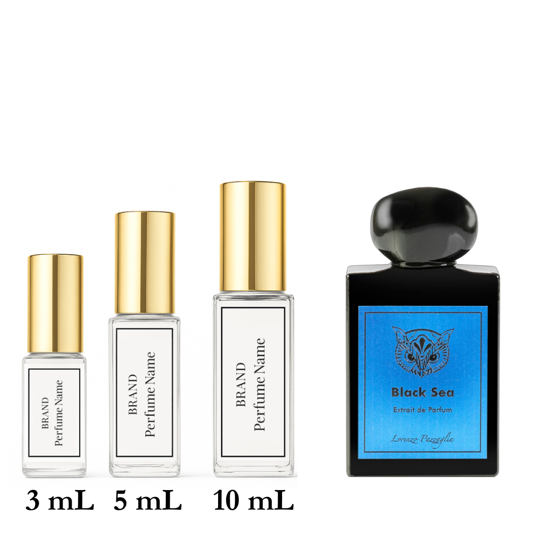 Set of perfume bottles with different sizes on a white background